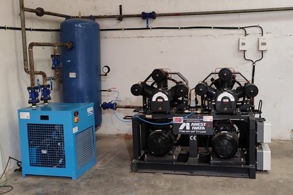 Our Installation of Anest Iwata Base Mounted Lubricated Reciprocating Compressor model BLS300 (30HP) and a refrigerant dryer in the Packaging Industry. 